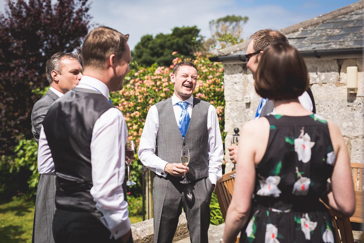 laughing groom