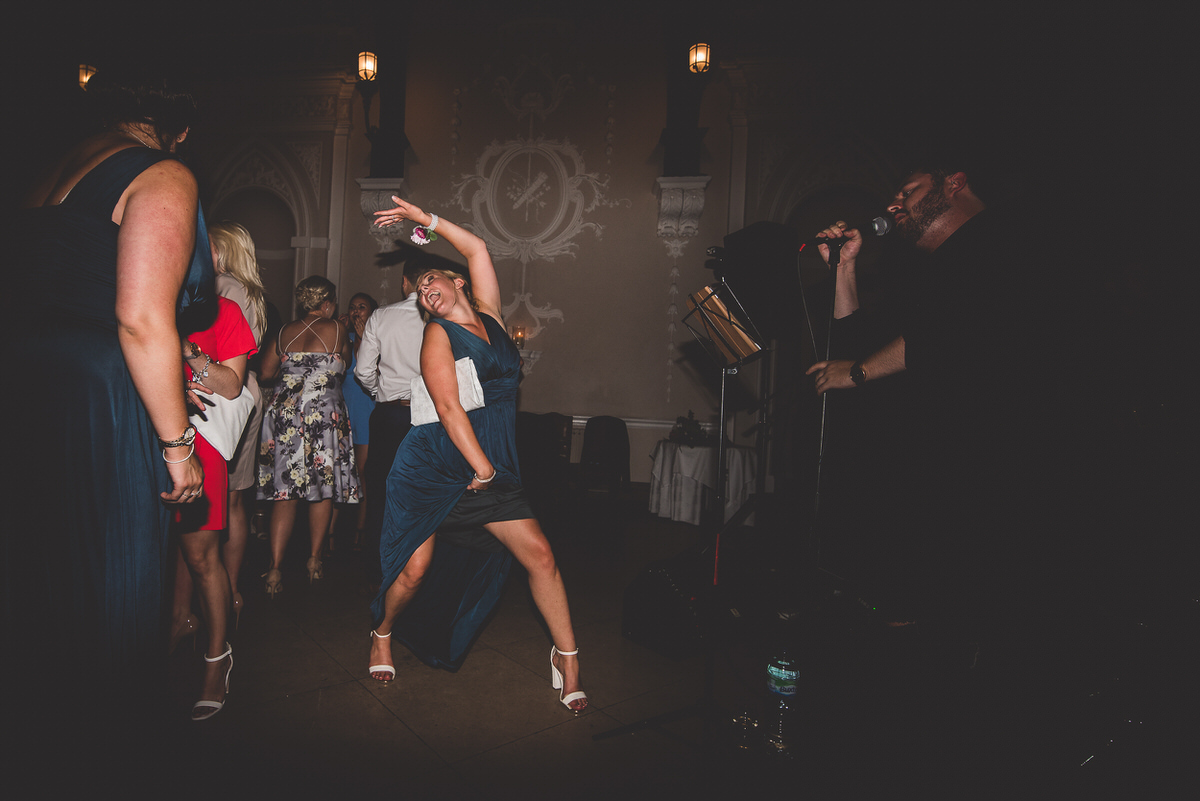 A bride dancing at her wedding.