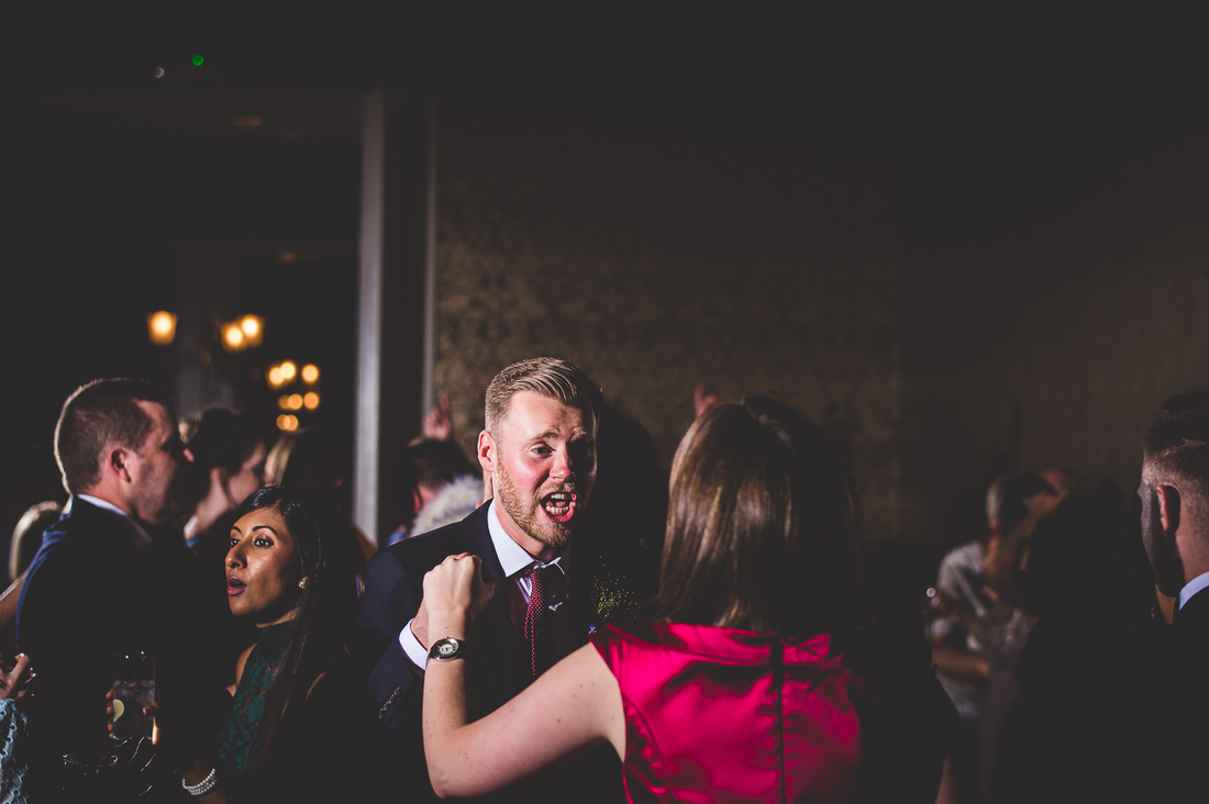 A wedding reception featuring a bride and groom's dance.