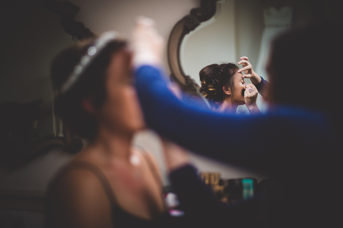 A bride preparing for her wedding day, captured by a wedding photographer.