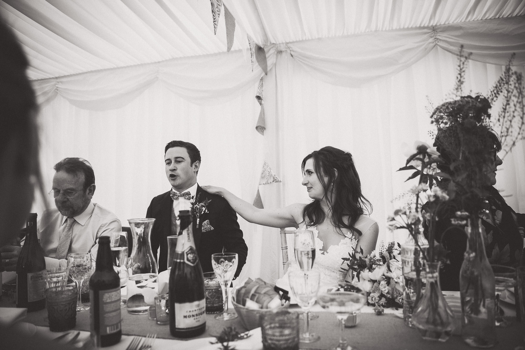 Black and white wedding photograph of a bride and groom captured by a wedding photographer.