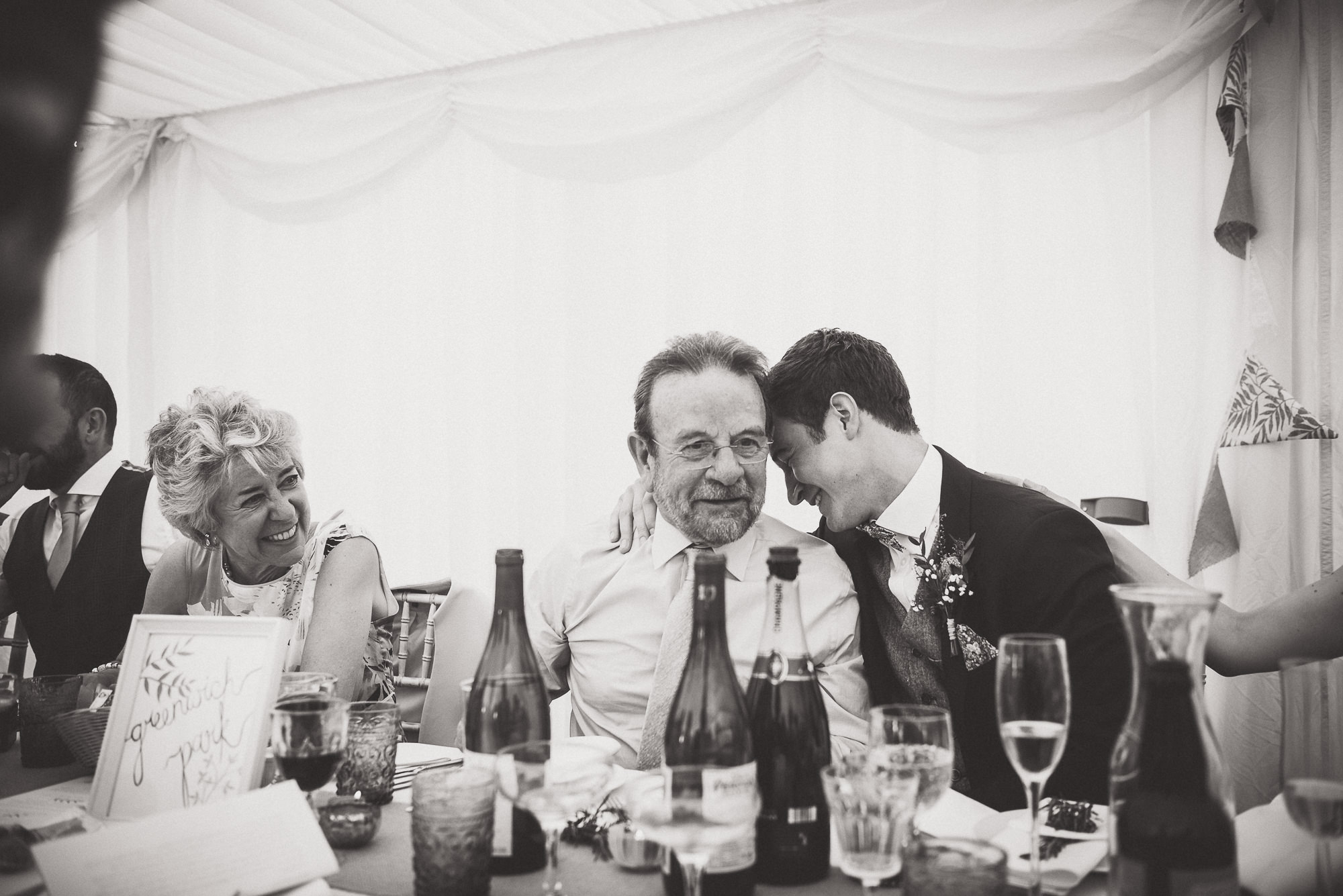 A black and white wedding photo featuring a man and a woman.