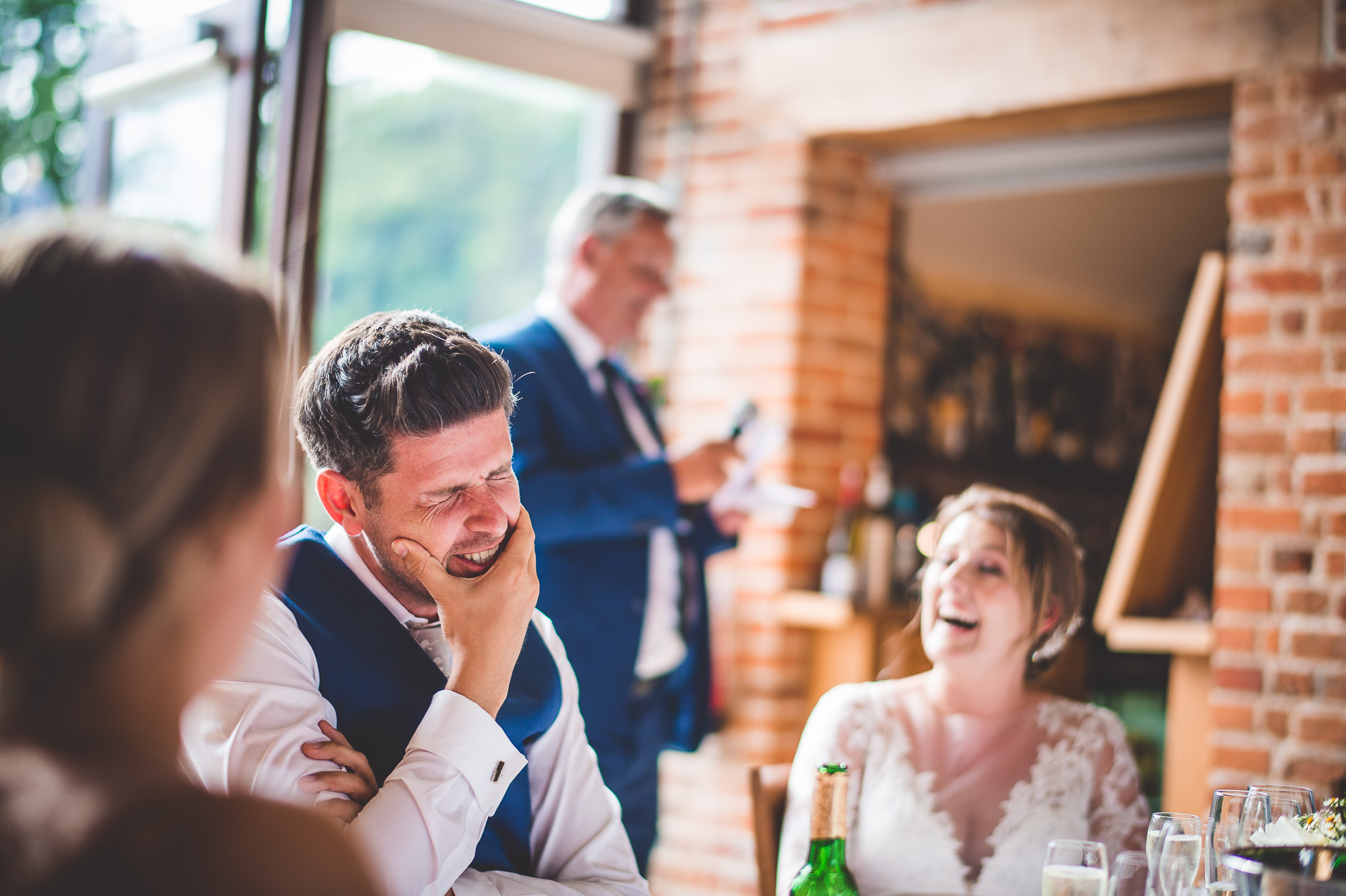 A joyful bride and groom captured in a wedding photo.