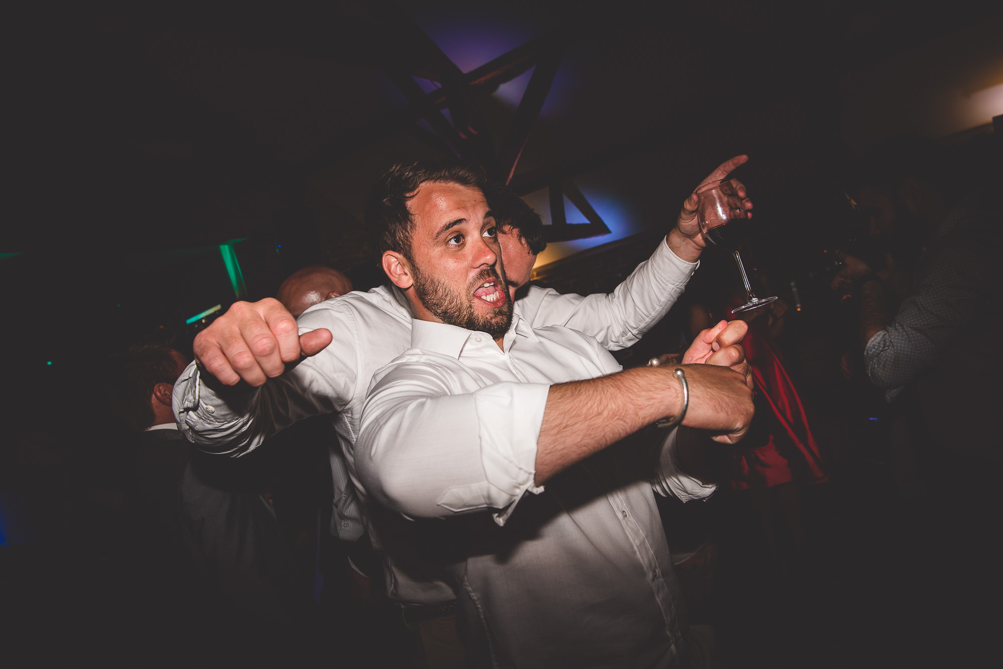 Groom and bride dancing at their wedding.