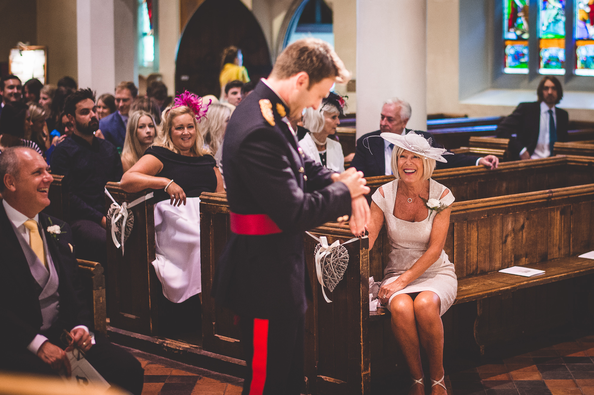 A wedding ceremony in a church with a bride and groom.