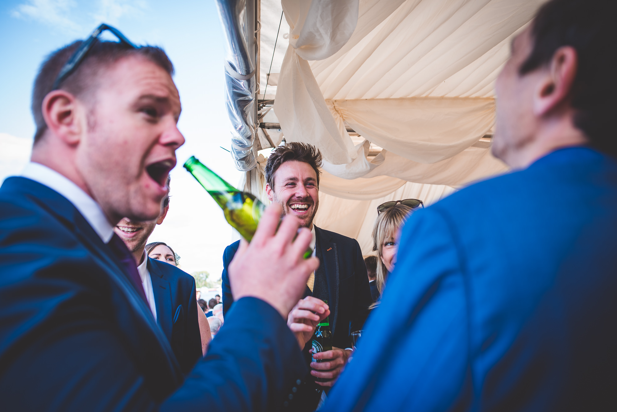 Men, beer, wedding.