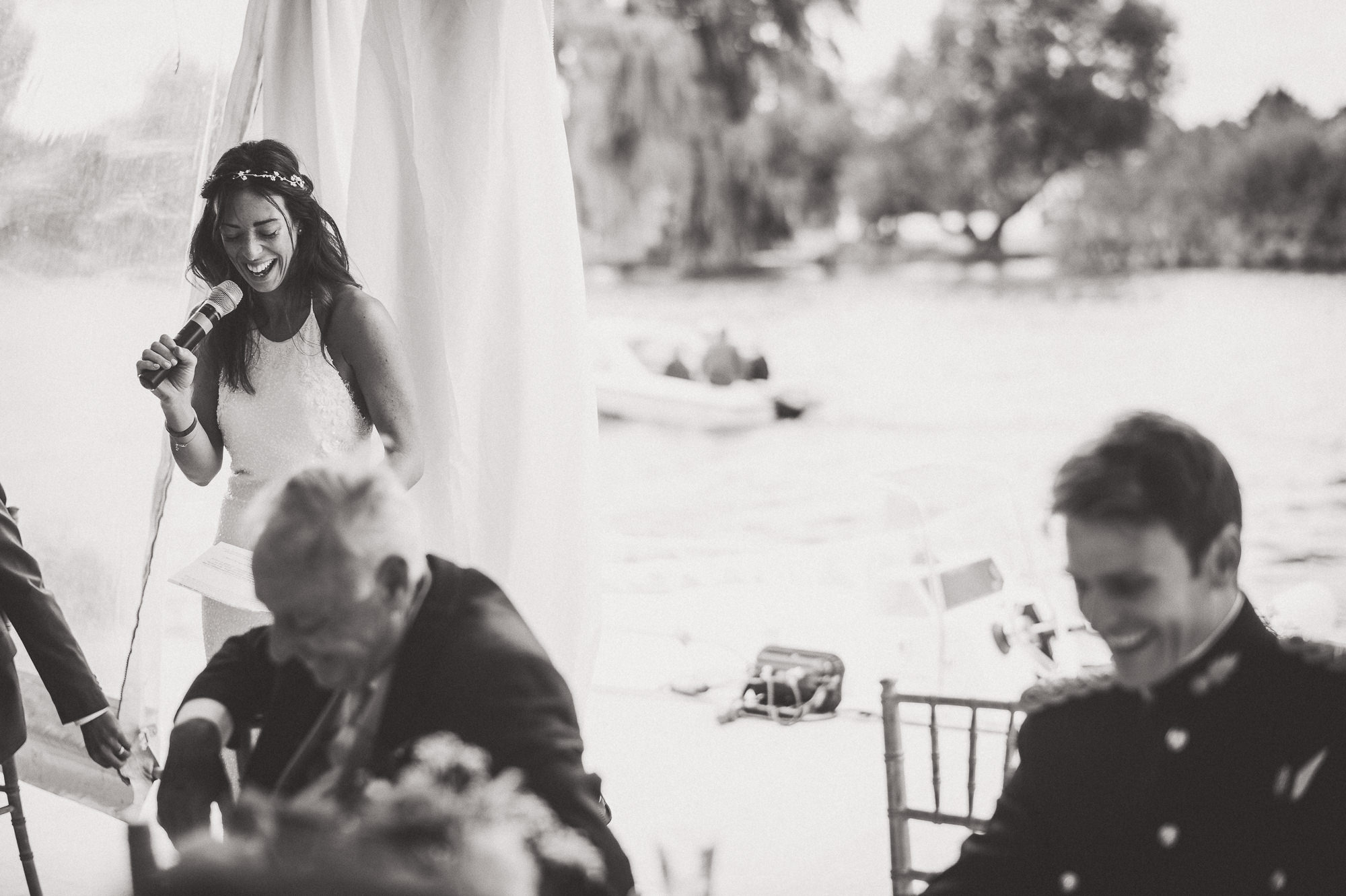 A groom and bride exchanging vows at their wedding ceremony.