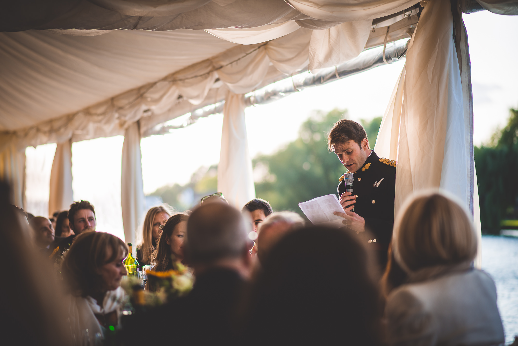 A groom giving a speech at his wedding.