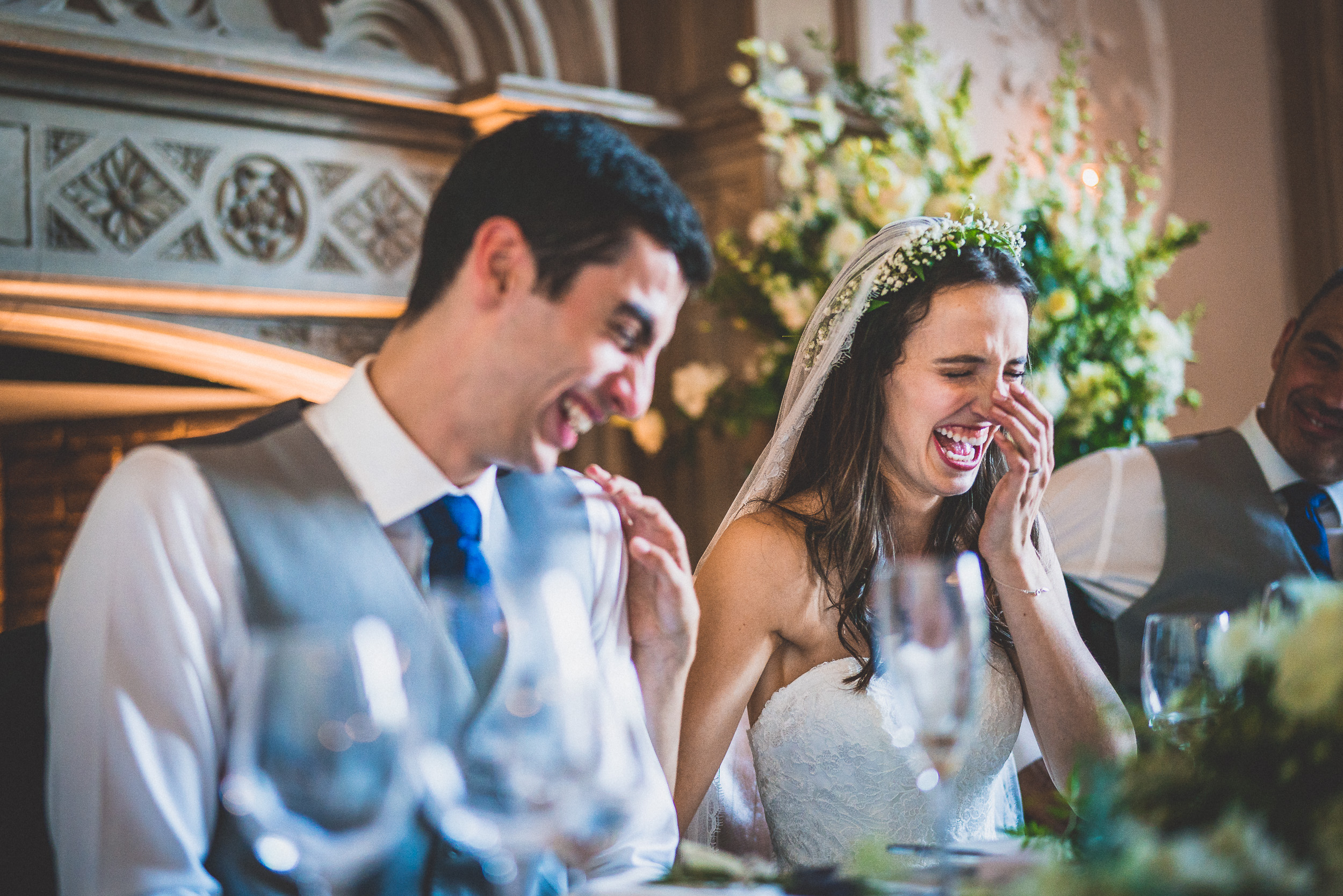 A bride and groom captured in a joyful wedding photo.