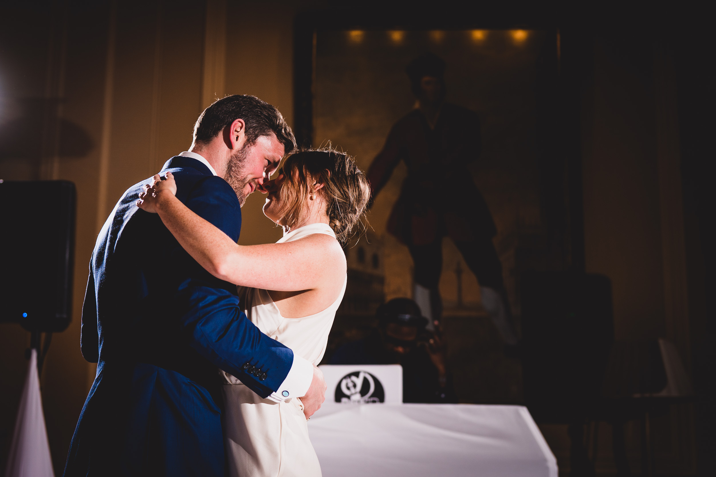 A groom and bride sharing their first dance at their wedding.