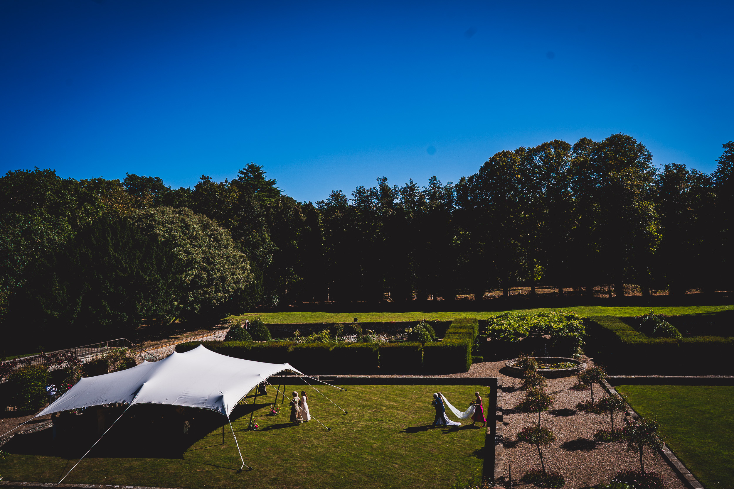 An aerial view capturing a tent in a garden, perfect for the wedding photographer to capture the intimate moments of the bride and groom.