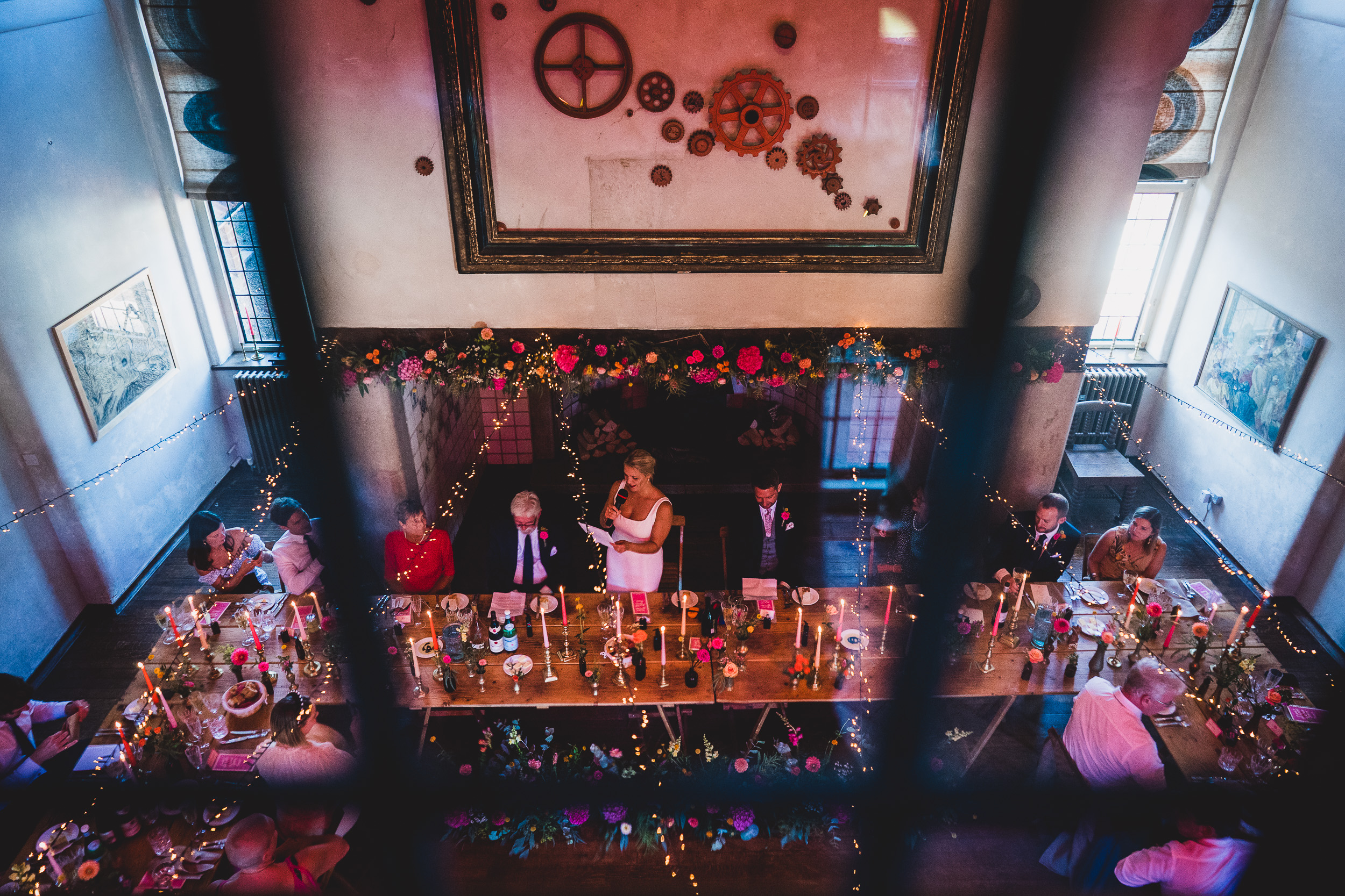 An aerial view of a wedding reception featuring the groom and captured by a wedding photographer.