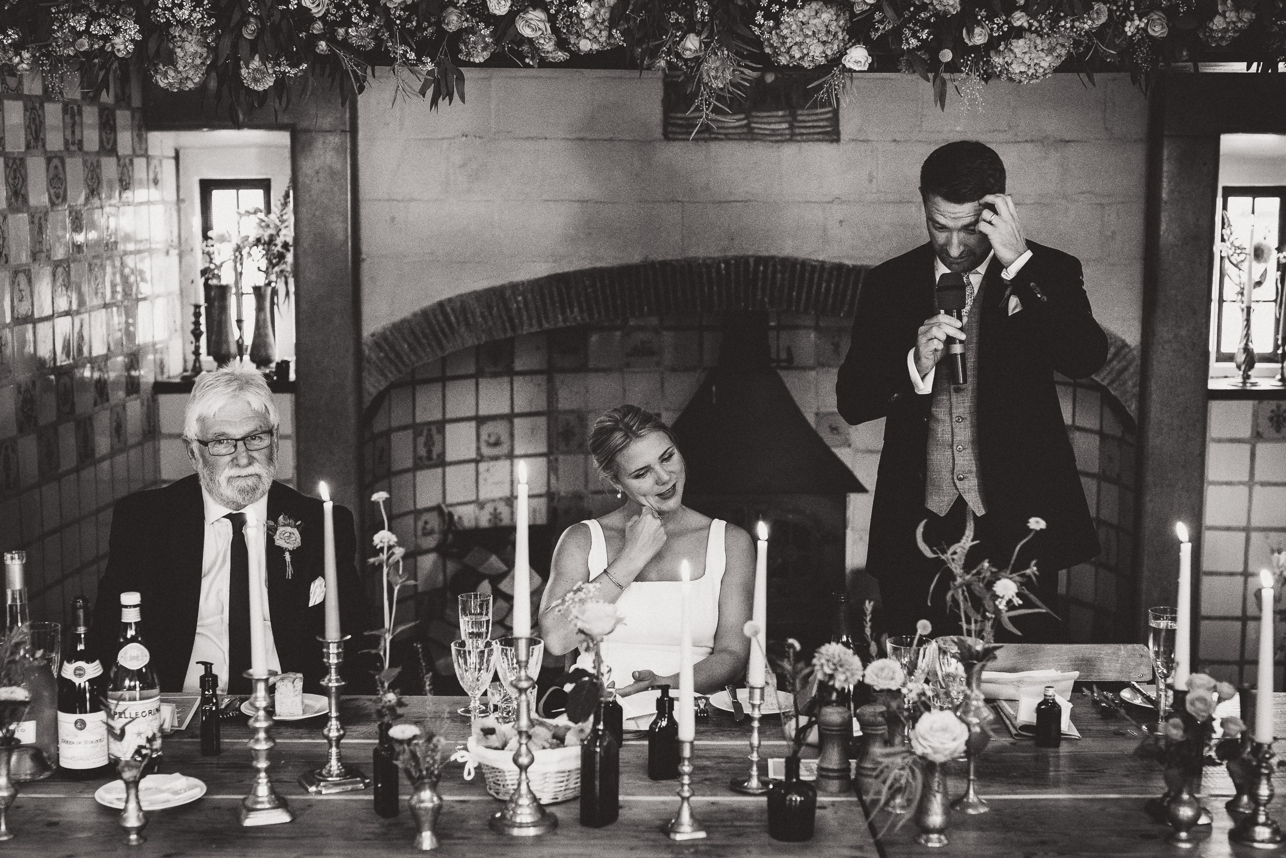 A photo capturing a bride and groom during their wedding reception.