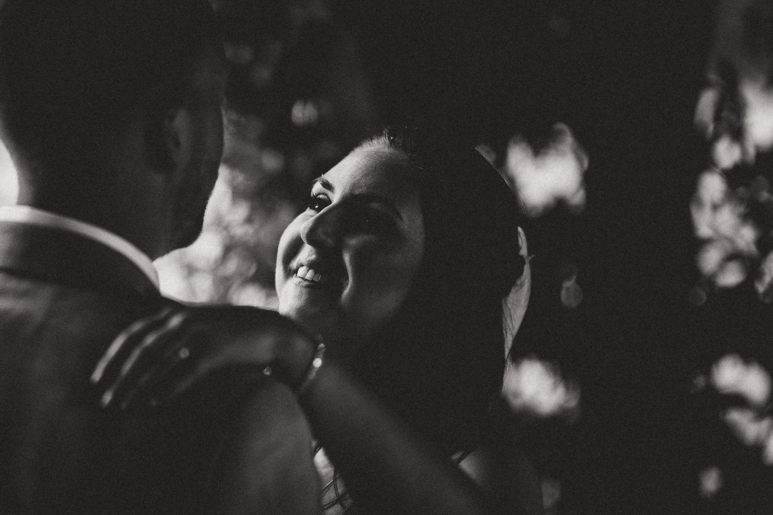 A black and white wedding photo of a bride and groom.