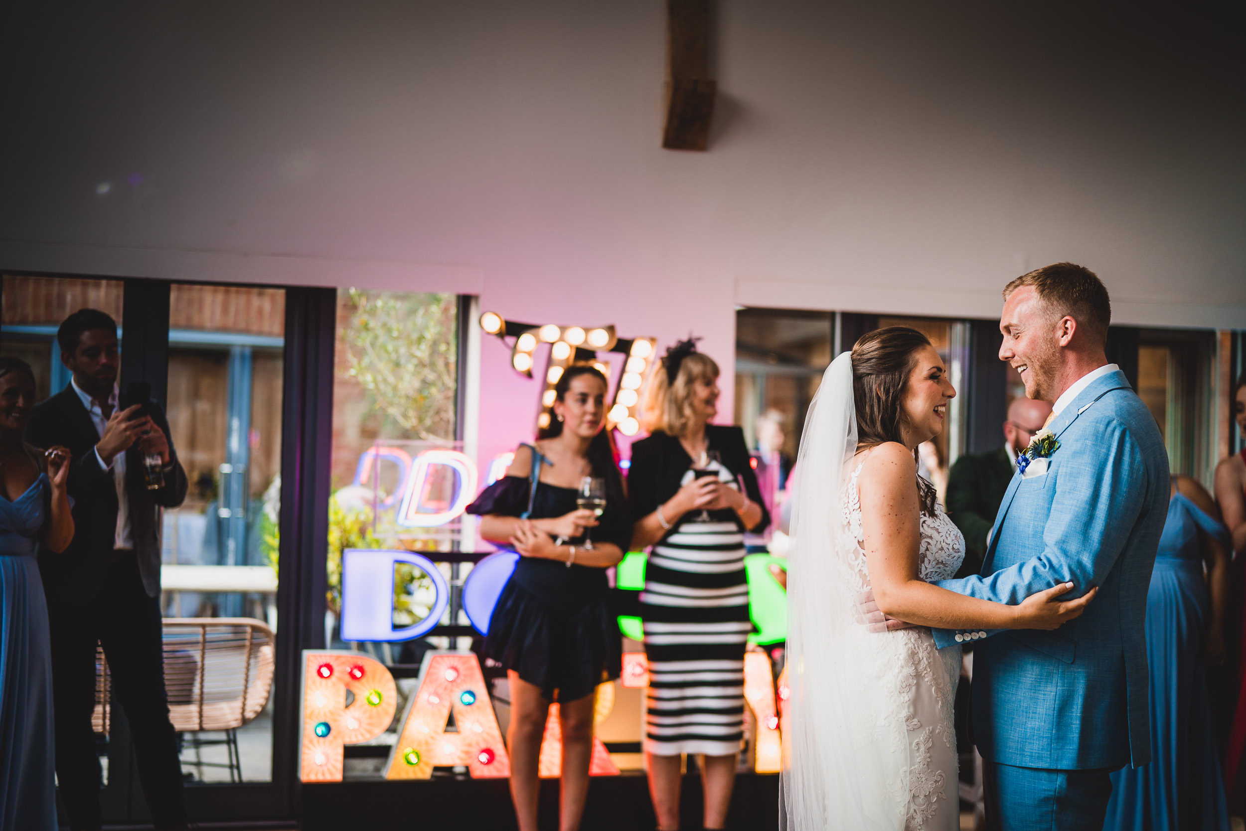 A newlywed couple's first dance at their wedding reception.