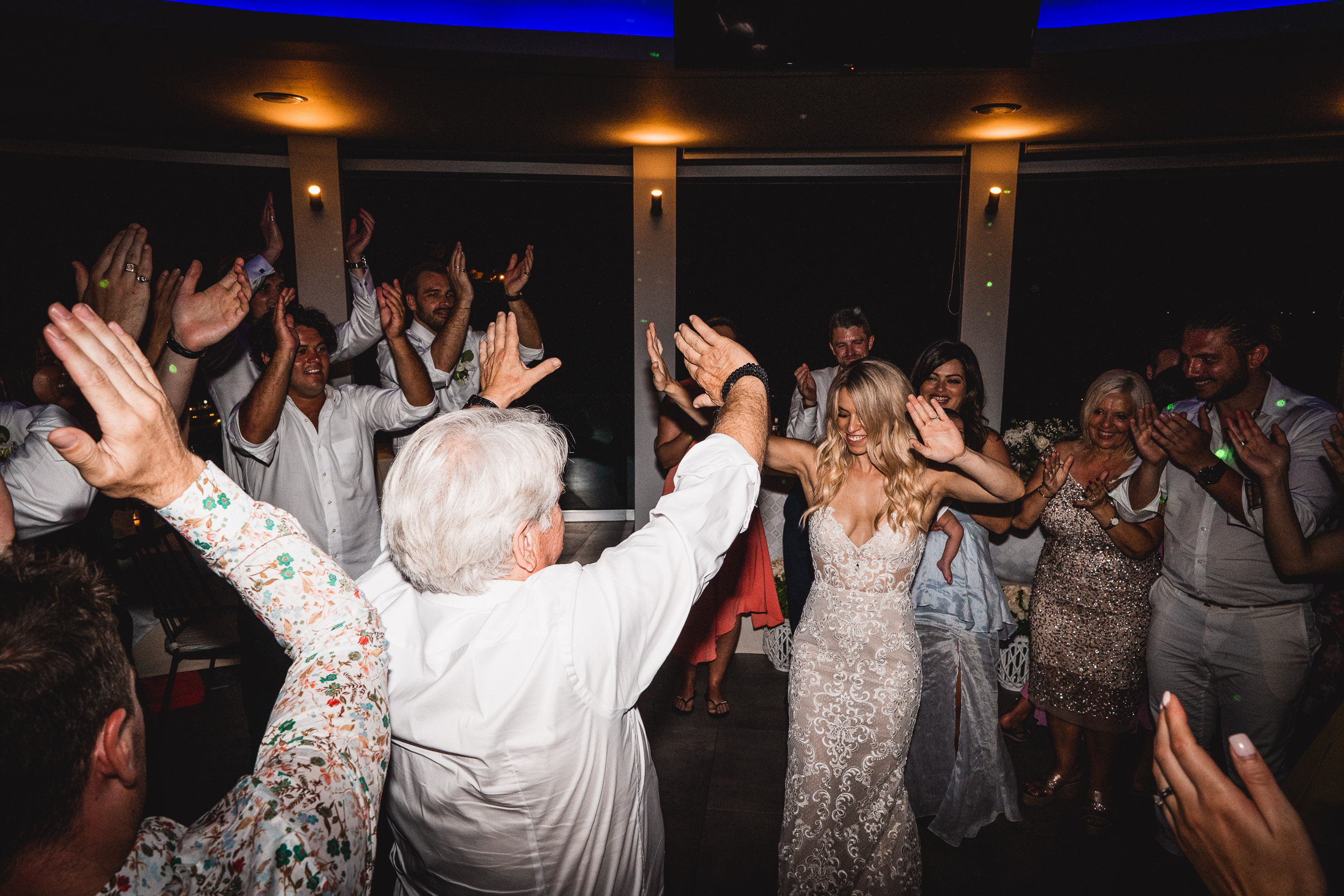 A bride and groom's wedding photo, capturing their dance on the dance floor.