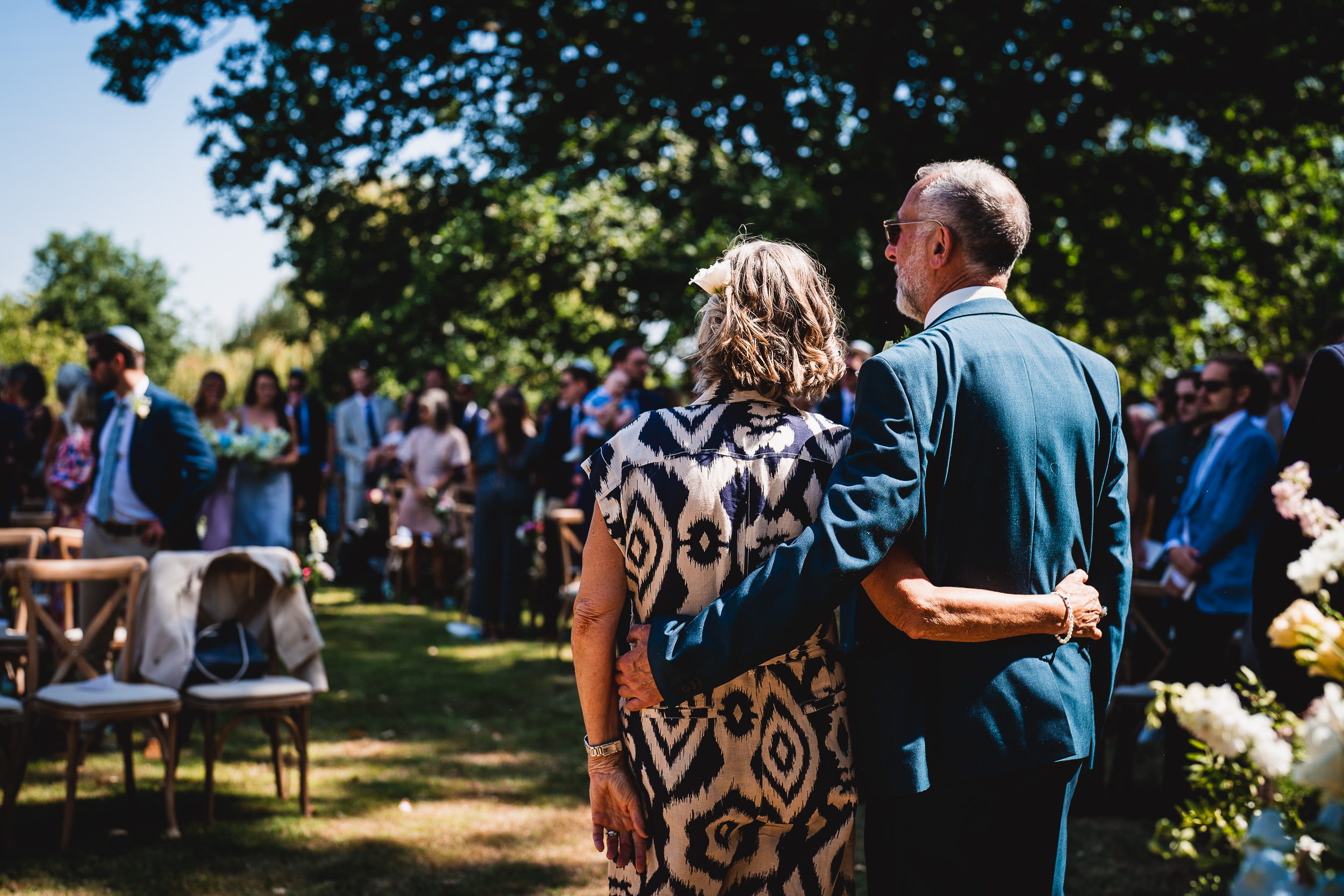 A couple posing for a wedding photo.