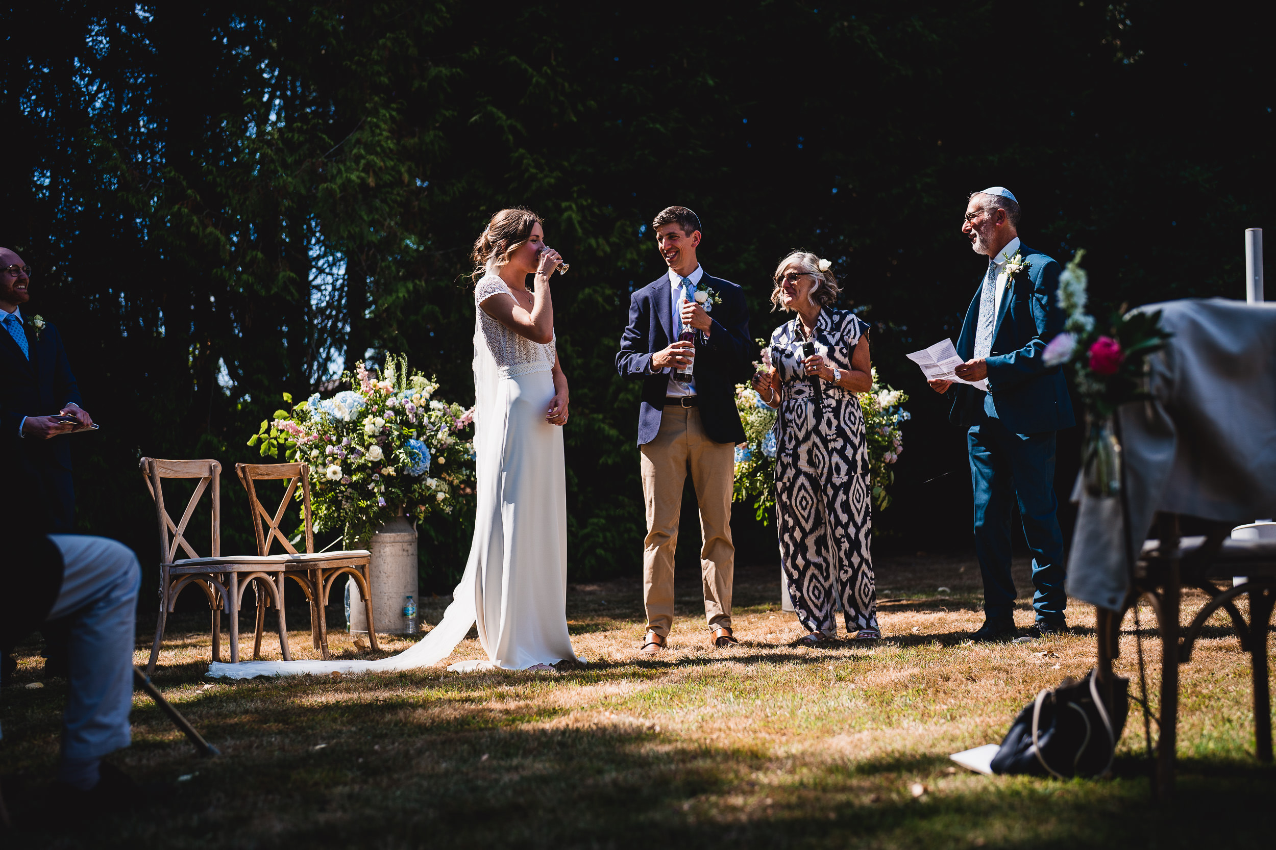 A garden wedding ceremony captured by a skilled wedding photographer.