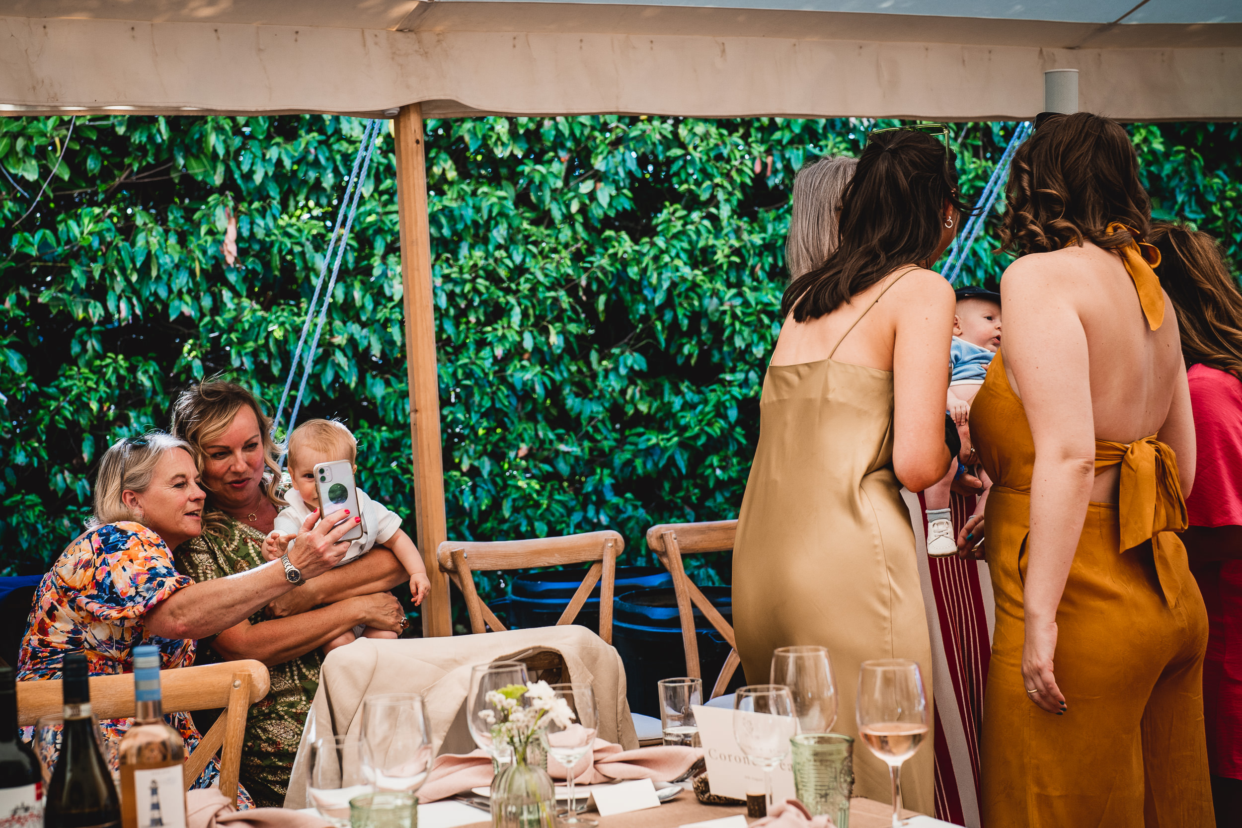 A group of people gathered at a wedding reception.