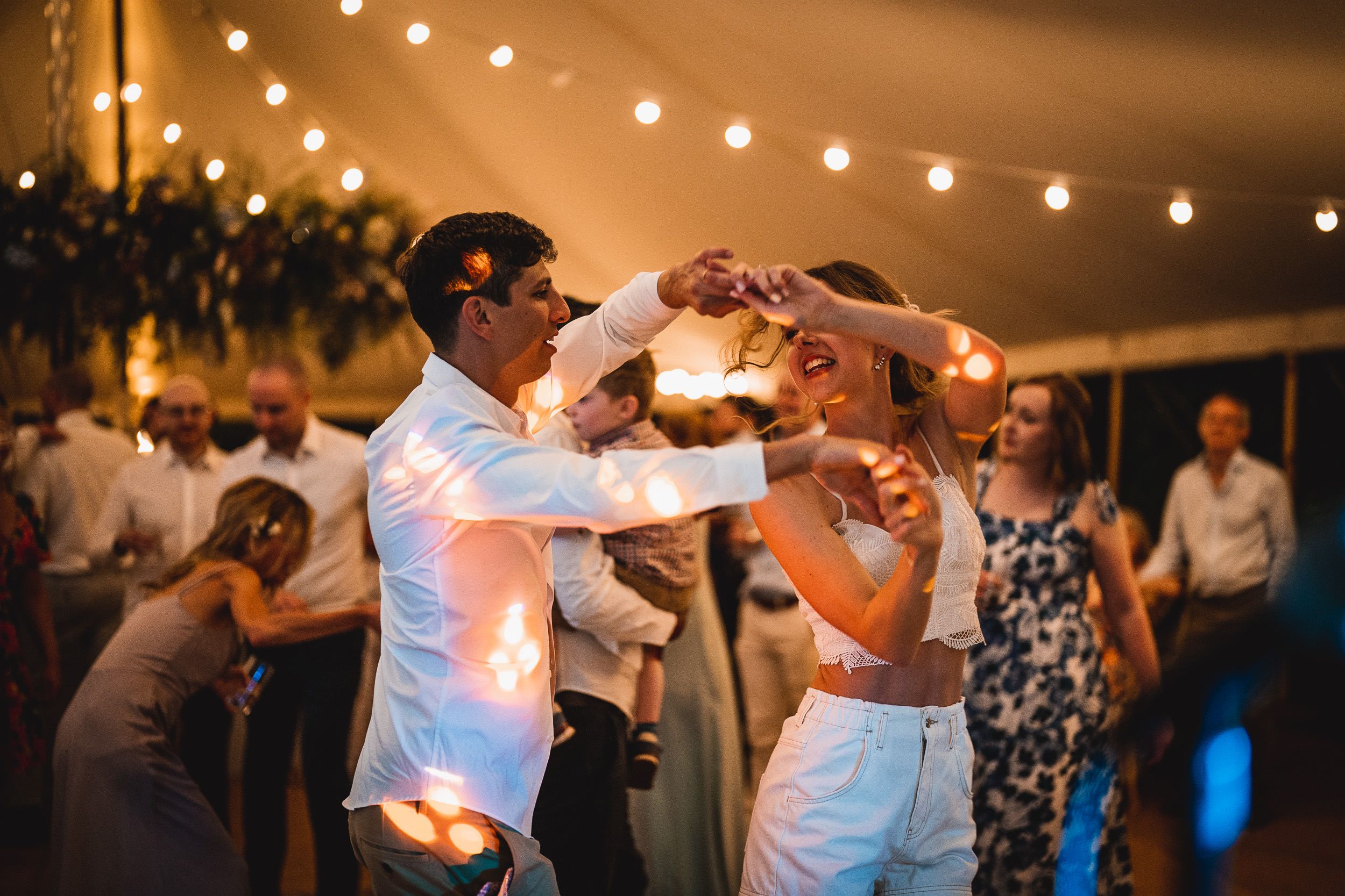 A bride and groom captivated in a wedding photo during their reception.