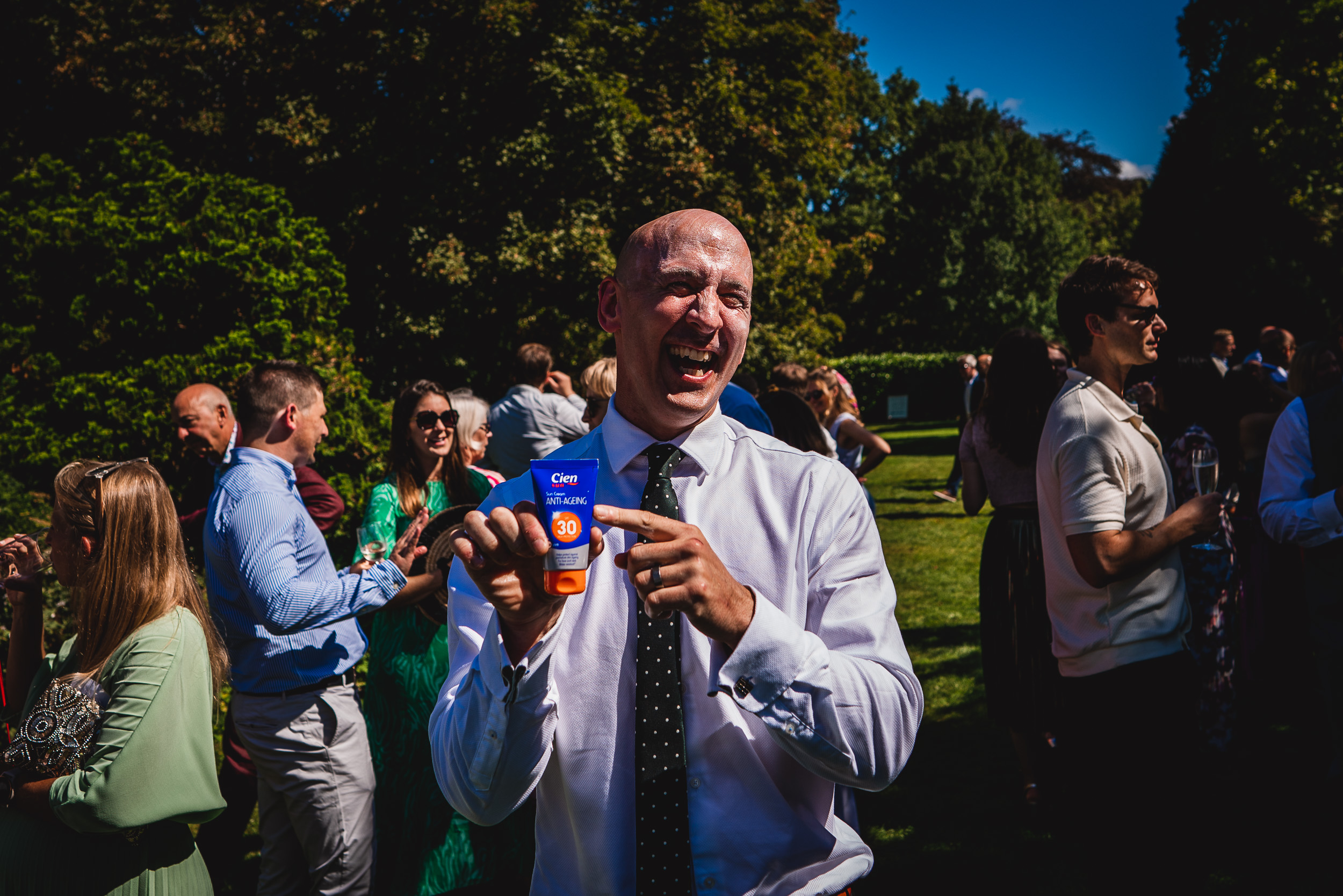 A man is holding a bottle of water at Ridge Farm.