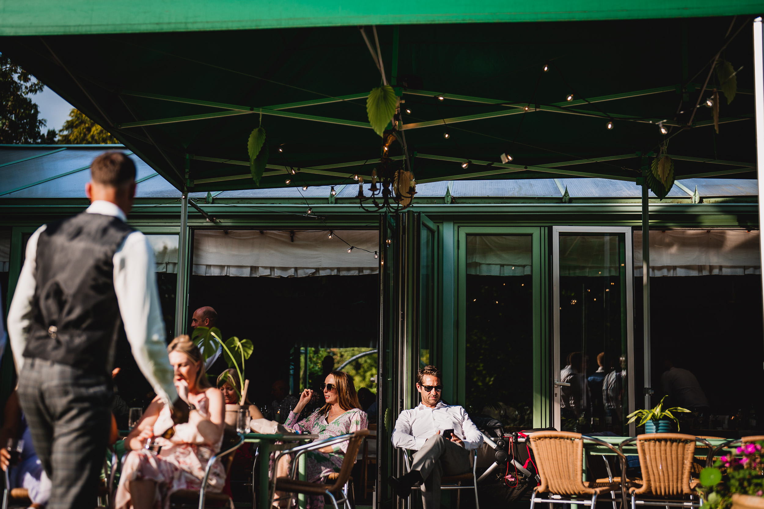 A group of people at the Ridge Farm restaurant in Surrey, enjoying a wedding celebration.