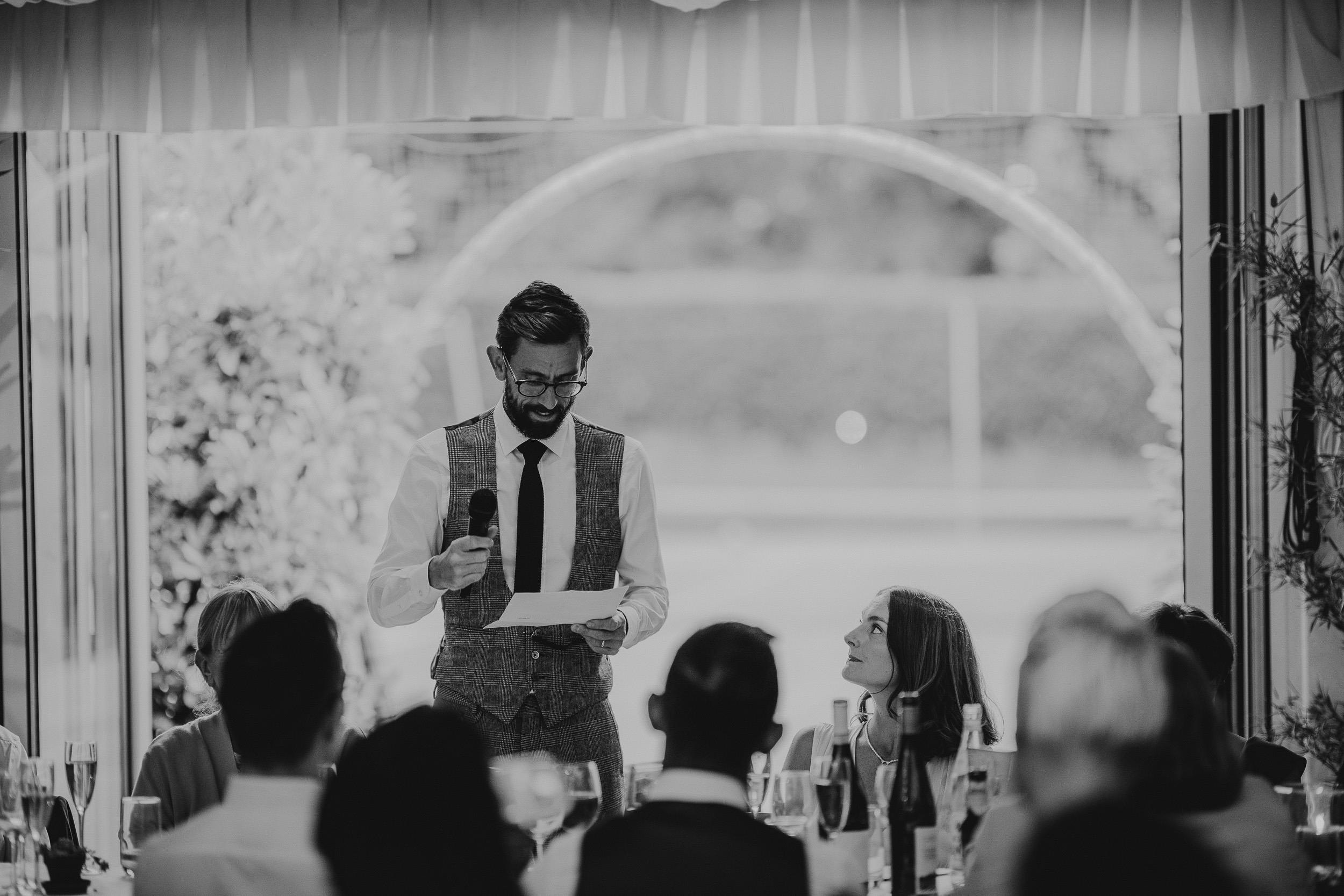 A man giving a speech at a Surrey wedding at Ridge Farm.