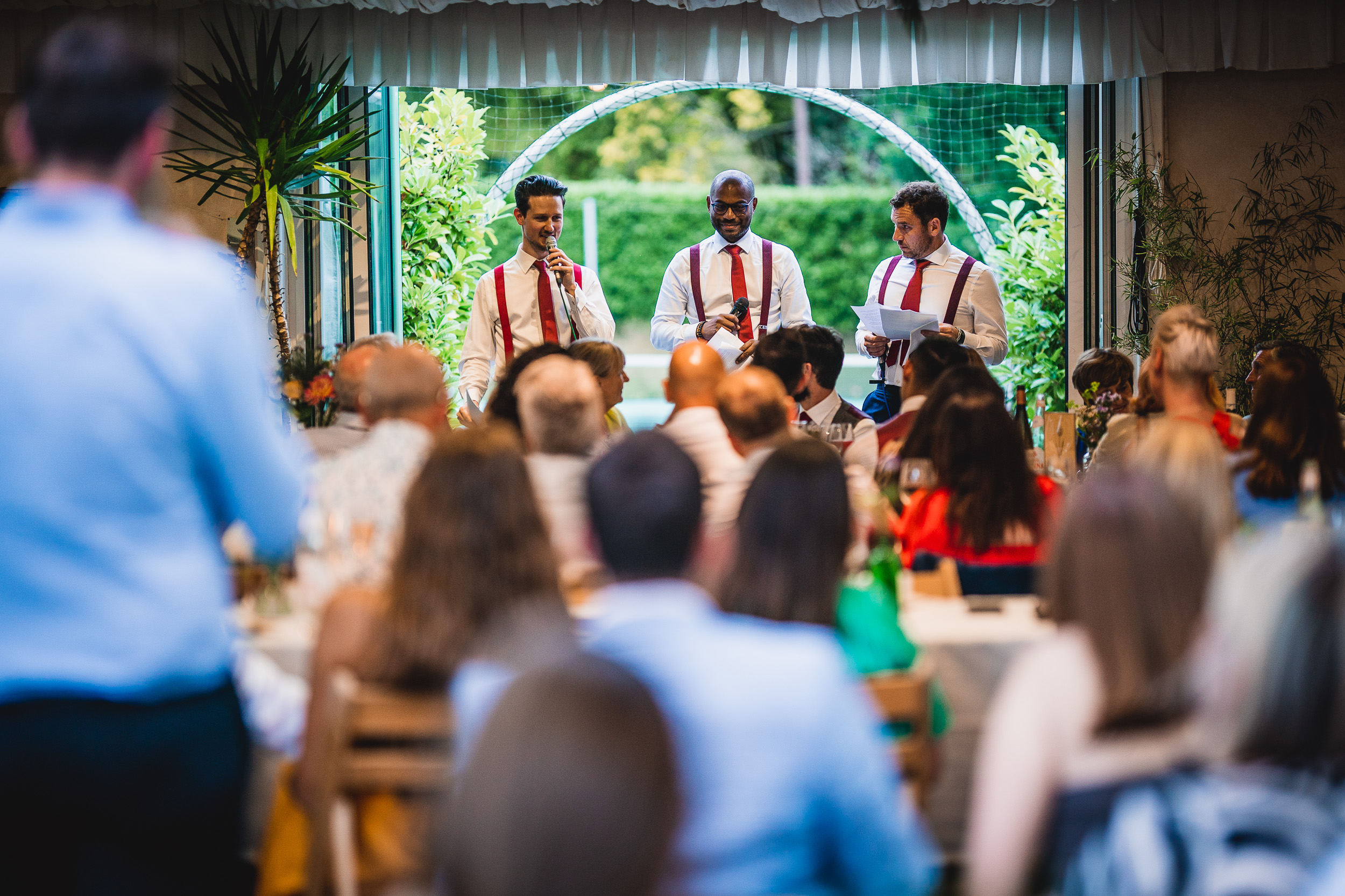 A group of men at a Surrey wedding reception.