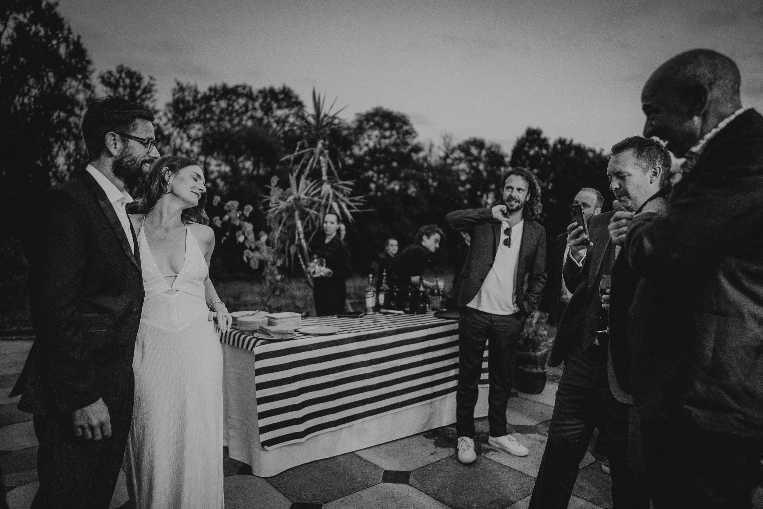 A black and white photo of a group of people at a Surrey wedding.