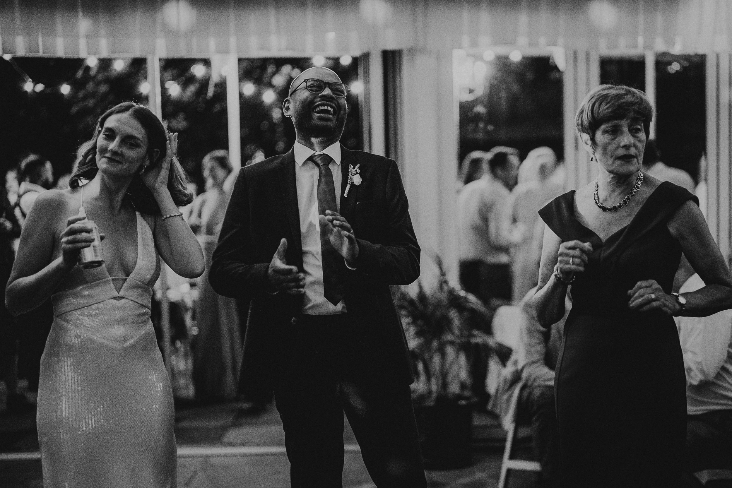 A newly married couple gracefully dancing at their Surrey wedding reception at Ridge Farm.